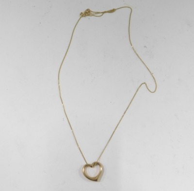 A 9ct gold heart shaped pendant and chain, the hollow heart 2cm high, on a fine link neck chain, 44cm long, 1.2g all in, boxed. (AF) - 2