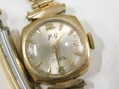 A PG lady's wristwatch, with a silvered numeric dial, in square case, 1.5cm diameter, yellow metal stamped 375, on a plated strap, 13.3g all in. - 2