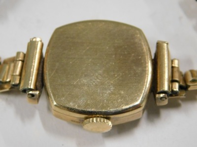 A PG lady's wristwatch, with a silvered numeric dial, in square case, 1.5cm diameter, yellow metal stamped 375, on a plated strap, 13.3g all in. - 3