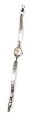 A Bulova stainless steel cased ladies wristwatch, the oval watch head, with a silvered dial and blue hands, 1cm diameter, on stainless steel bracelet. - 2