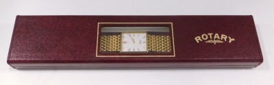 A Rotary gentleman's wristwatch, the rectangular white faced dial, with Roman numerals and date aperture, on a plated strap, boxed. - 4