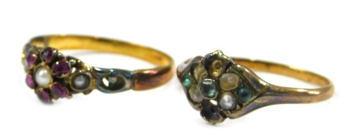 Two dress rings, comprising an Edwardian cluster ring, set with garnets and seed pearls, on a yellow metal band, unmarked, ring size O½, and a cultured pearl and imitation emerald set cluster ring, plated, ring size O½, 3.7g all in. (2)