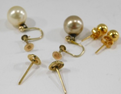 Three pairs of earrings, comprising a pair of cultured pearl and yellow metal screw back earrings, stamped 9ct, a pair of 9ct gold ball studs, with butterfly backs, and a pair of yellow metal and opal set studs, lacking backs, unmarked, 6.4g all in. (3) - 2