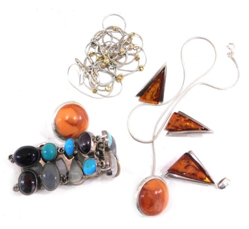 A group of silver and other costume jewellery, comprising a multi stone set white metal bracelet, stamped 935, 18cm long, a suite of imitation amber Art Deco jewellery, comprising necklace with broken chain, a pair of earrings, each stamped 925, a pair of