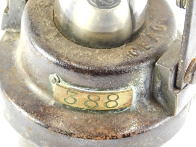 A C.E.A.G. of Barnsley steel and brass miner's lamp, numbered 388 and 369 respectively, 28cm high. - 2