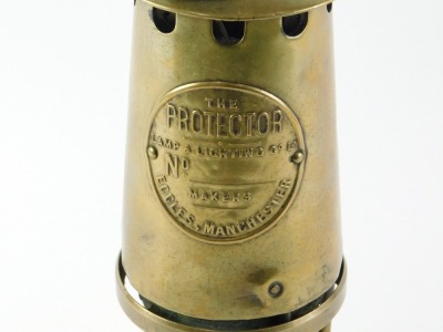 A Protector brass miner's lamp, 28cm high. - 2