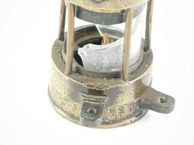 A brass and iron miner's lamp, lacking name plate, etc., (glass AF), 25cm high. - 2