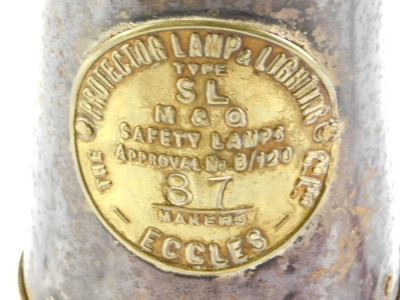 A Protector Lamp and Lighting Company mining lamp, numbered 87, bearing crest in carry hook, converted to electricity, 23cm high. - 2