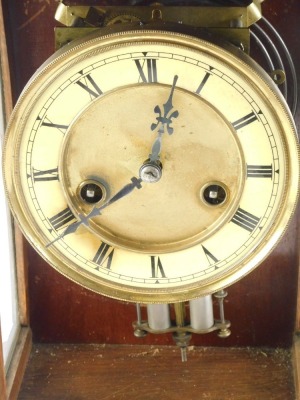 A 19thC continental mantel clock, the paper dial with Roman numerals, in a beech case, 35cm high. - 2