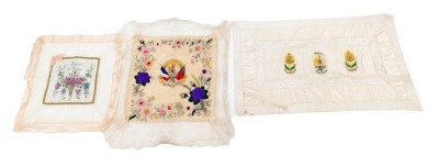 A collection of WWI related embroideries, each decorated with various emblems, titled souvenir France, etc.