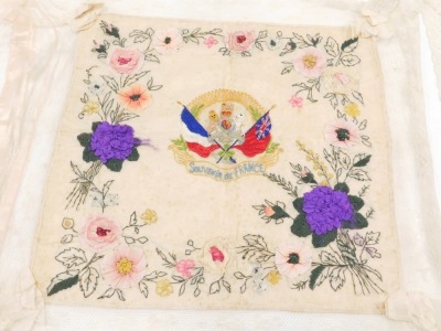 A collection of WWI related embroideries, each decorated with various emblems, titled souvenir France, etc. - 3