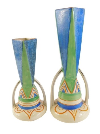 An Art Deco pottery vase, decorated with geometric design, 33cm high, and another similar, 26cm high.