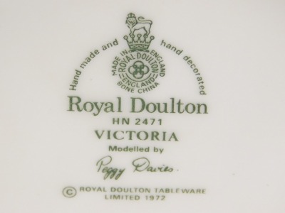 Two Royal Doulton figurines, Top o' the Hill, and Victoria. - 2