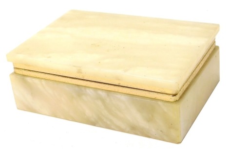 An onyx rectangular jewellery box, with gilded rim, 5.5cm high, 16cm wide, 10.5cm deep.