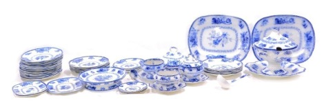 A group of Wedgwood 20thC blue and white wares, comprising two large meat plates, 36cm and 34cm wide, a large urn and ladle, 27cm high, two small tureen and covers, one tureen without cover, one ladle, two sucriers, soup bowl, twenty four dinner plates, c