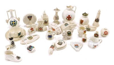 A quantity of crested china, to include tanks, some Lincoln pieces, ferris wheel, sundial, etc. (1 tray)