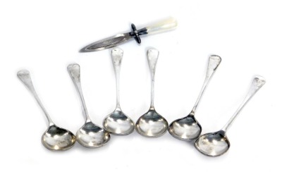 A set of six George V silver fiddle pattern tea spoons, maker AJB, Birmingham 1933, and a white metal and mother of pearl handled miniature bookmark sword, 1.89oz. (7)