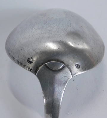 A 19thC Continental white metal stuffing spoon, with plain handle, and bowl, with faint markings JS, 5oz, 35cm long. - 3