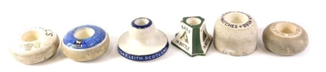 Five ceramic match strikes, comprising Puck and Webb, Buckinghams, White Horse Whisky and Base in a Bottle ashtray. (6)