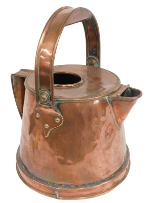 A late Victorian copper jug, with swing handle, 38cm high.