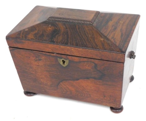 A George III partridge wood tea caddy, with rosewood and boxwood strung borders, and canted corners, the hinged lid enclosing divisions with later lids, 18cm wide.