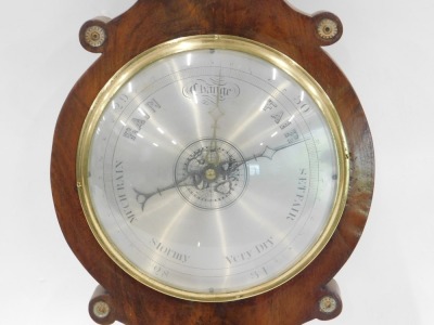 A 19thC figured mahogany wheel barometer, stamped A&J Casartelli, Liverpool, with silvered dial and thermometer, 99cm high. - 2