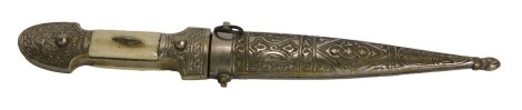 A Middle Eastern dagger, the hammered scroll case, set with two bone finials, inscribed Damascus 1944, on short blade with scabbard, 29cm lonh.