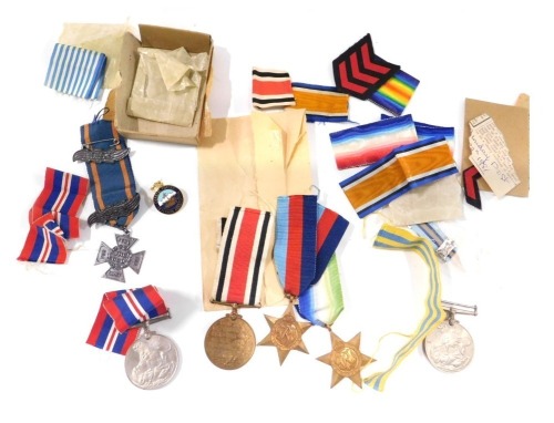 A collection of World War II and later medals, comprising two George VI medals, unawarded, a 39-45 Star, Atlantic Star, Faithful Constabulary medal, various ribbons, a Zeal for Christ JMCDSO crest, acorn leaves for 1969 and 1968, various ribbons, etc. (a