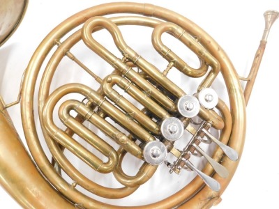 A brass french horn, with stainless steel mouthpiece, in fitted case. - 2