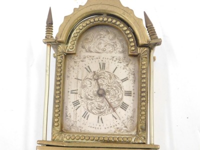 A miniature brass longcase clock, the silvered dial stamped Frank Flower, 31 St James's Street W, the case cast with masks and faux door engraved with a mask, foliate scrolls, etc., 29.5cm high. (AF) - 2