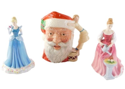 A Royal Doulton Santa Claus character jug, a Doulton figure of Cinderella, and a figure Alexandra.