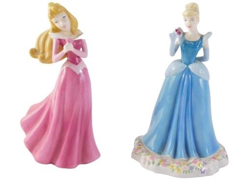 A Royal Doulton Disney Sleeping Beauty figurine, and another Cinderella.