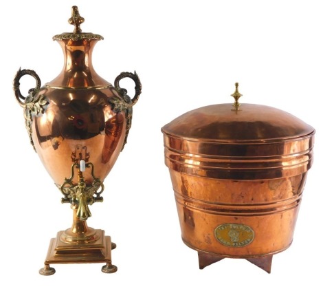 A 19thC copper and brass two handled tea urn, 60cm high, and a dolphin beer filter with associated lid, 36cm high. (2)