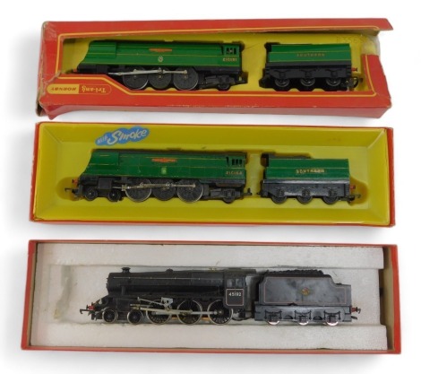 Hornby OO gauge locomotives, including a Battle of Britain class Winston Churchill 21C151 in Southern Green, BR standard class Black Five locomotive, 45192 in BR lined black, and Battle of Britain class Fighter Command 21C164 in Southern Railways green, b