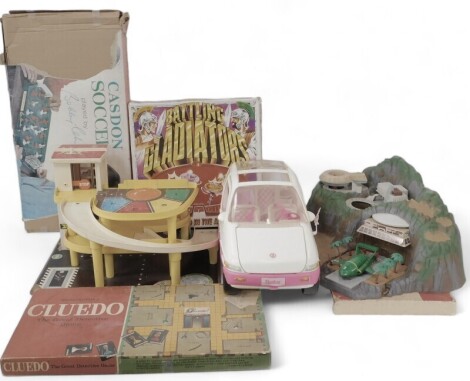 Toys and games, including a Barbie car, Fisher Price garage, Tracy Island play set with Thunderbird 2 and 3, Battling Gladiators, Casdon Soccer and Monopoly, etc. (a quantity)