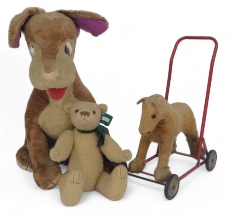 A Merrythought 'Tramp' plush jointed dog, a 1950's Chilton push-along-horse, and a Harold Teddy Bear. (3)