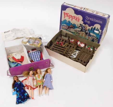 Four 1970s Palitoy Pippa and friends dolls, dressed, together with additional clothing, shoes, hats, clothes hangers, etc., in a pink plastic Pippa case, together with Pippa's Gymkhana Set, boxed.