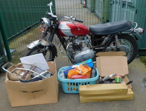 A 1970s Triumph Bonneville T120R, 650cc engine, frame no. ED51502, 56,999 recd miles, with various boxed parts, tools and accessories