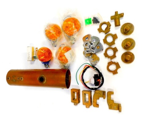 A copper piston casing, motorbike indicator lights, Stewart castings, etc. (1 tray)