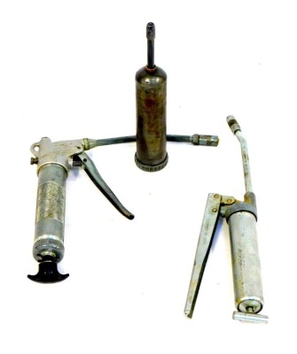 Three grease guns, including Wanner.