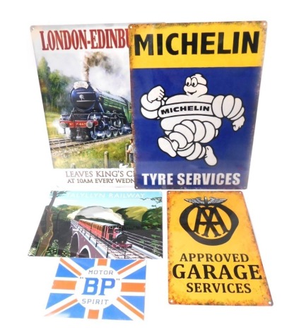 A group of reproduction metal automobile related posters and related signs, comprising Moto BP Spirit, Talyllyn Railway, AA Garage Service, Michelin Tyre Service, and London Edinburgh Flying Scotsman Train, the largest 40.5cm x 32cm. (5)