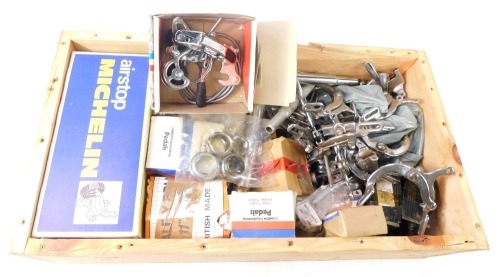 A collection of bicycle parts, to include brake handles, pedals, Air Stop Michelin inner tubes, etc. (1 box)