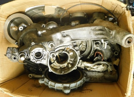 A group of automobile parts, including crank cases, gearbox casing. (1 box)