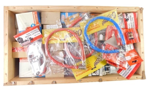 A group of bicycle parts, to include valve inserts, combination cable locks, locks, Sportsman toe clips, etc. (1 box)