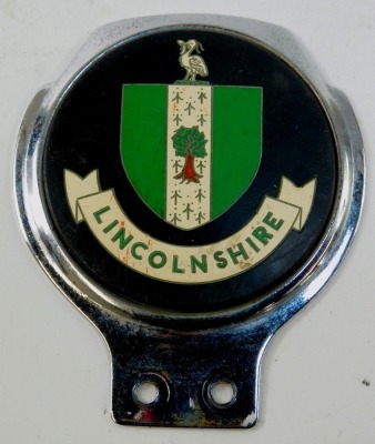 Four car badges, comprising Lincolnshire Automobile Club car badge, British Medical Association car badge, Lincolnshire car badge, and a Velocette badge. (4) - 4