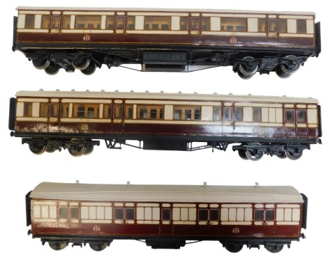 Three 'O' gauge scratch built passenger coaches for Caledonian Railways, and a part built coach. From the Collection of George Mackinnon-Ure, see lot 130.