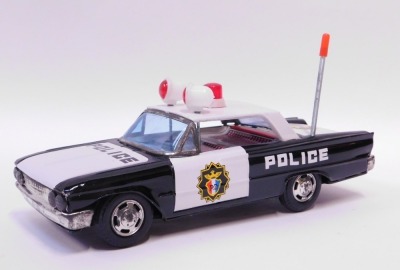 An Ichico of Korea friction powered tinplate police car, boxed. - 2