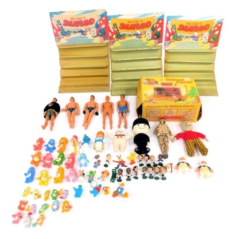 Various toys and games, comprising Smurfs, Rupert Bear, Action Men, Homepride Men, Clubhouse Caboo set, and wall mounted figure sets. (a quantity)