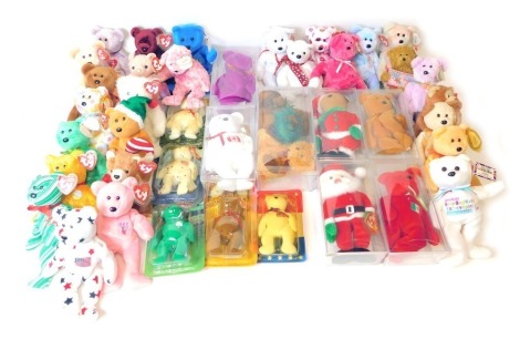 A collection of TY Beanie Bears, comprising blister pack American advertising bears, Christmas TY Beanies, Royalty and commemorative Teddy bears, October Bear, etc. (2 boxes)