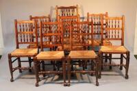 A set of eight spindle back rush seated dining chairs